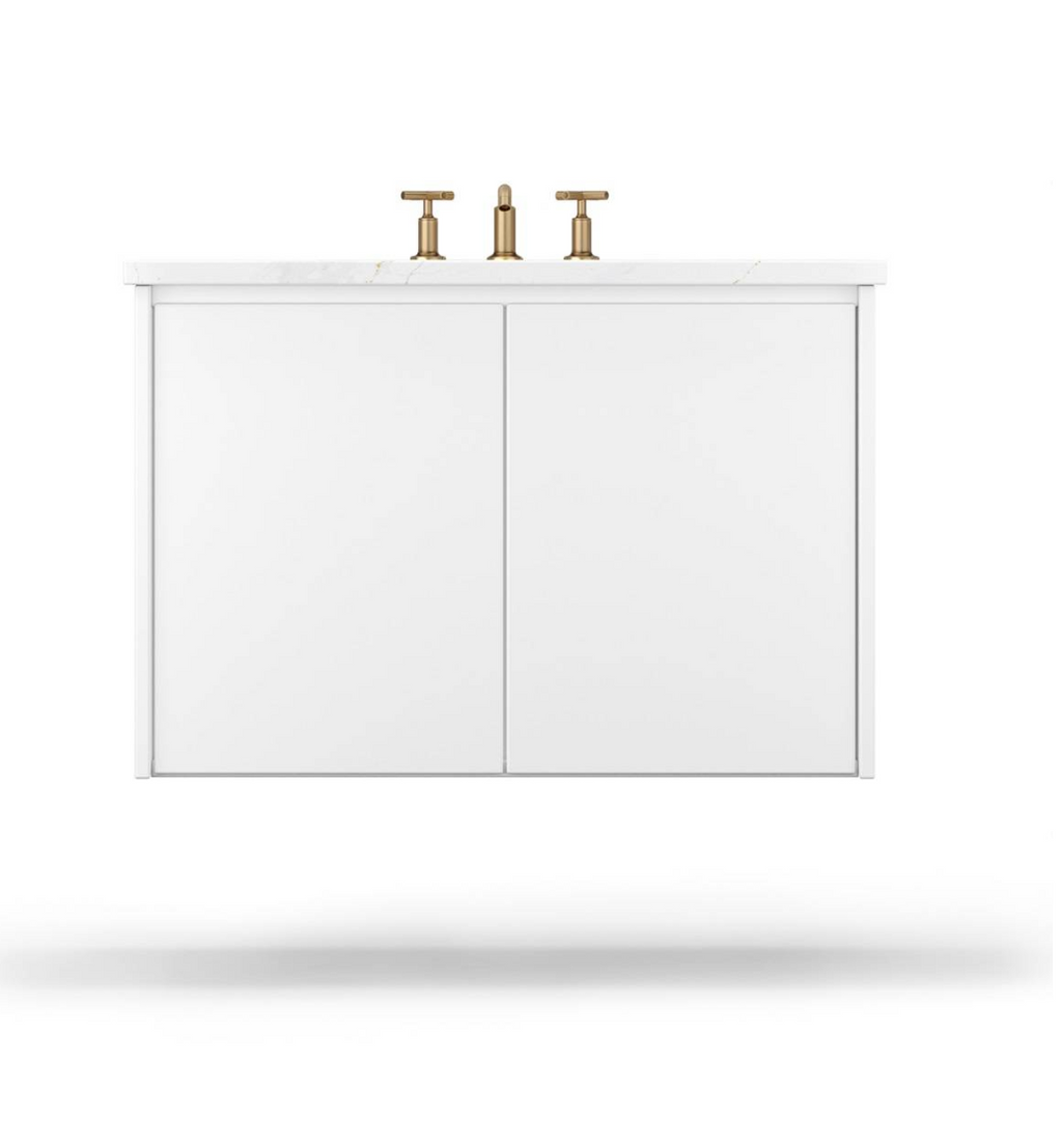 Sleek white floating vanity with finger gap detail and brushed gold faucet, crafted in a minimalist profile