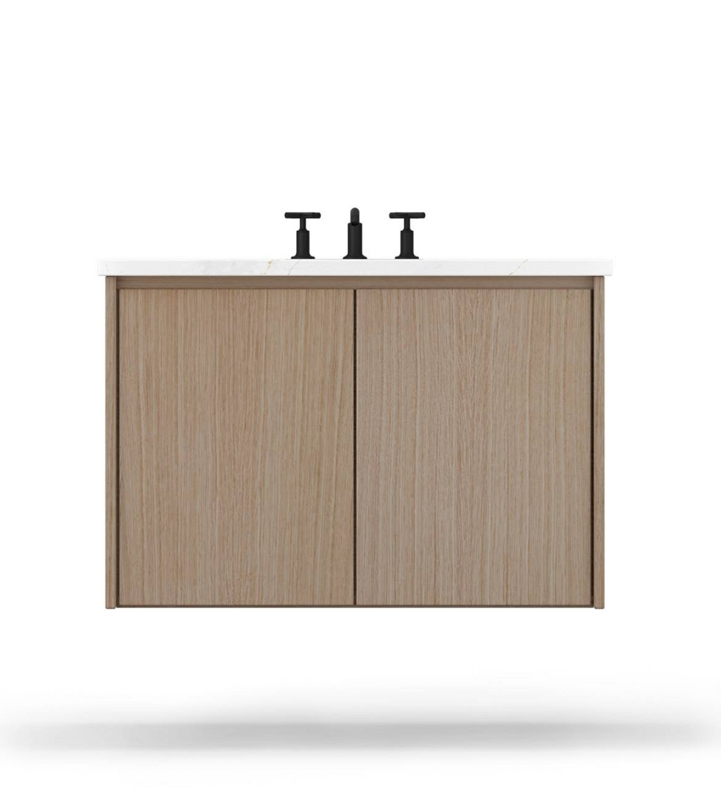  Floating wood vanity with finger pull design in rift white oak, shown with black faucet and marble top