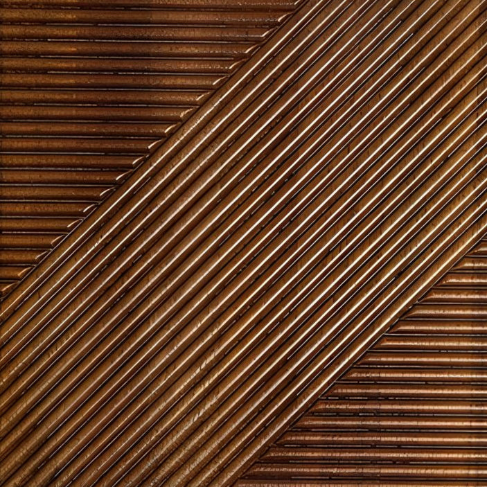 Close-up of Diagonal Divide sculpted tile in maple finish, featuring sharp diagonal ribbing and natural wood grain.