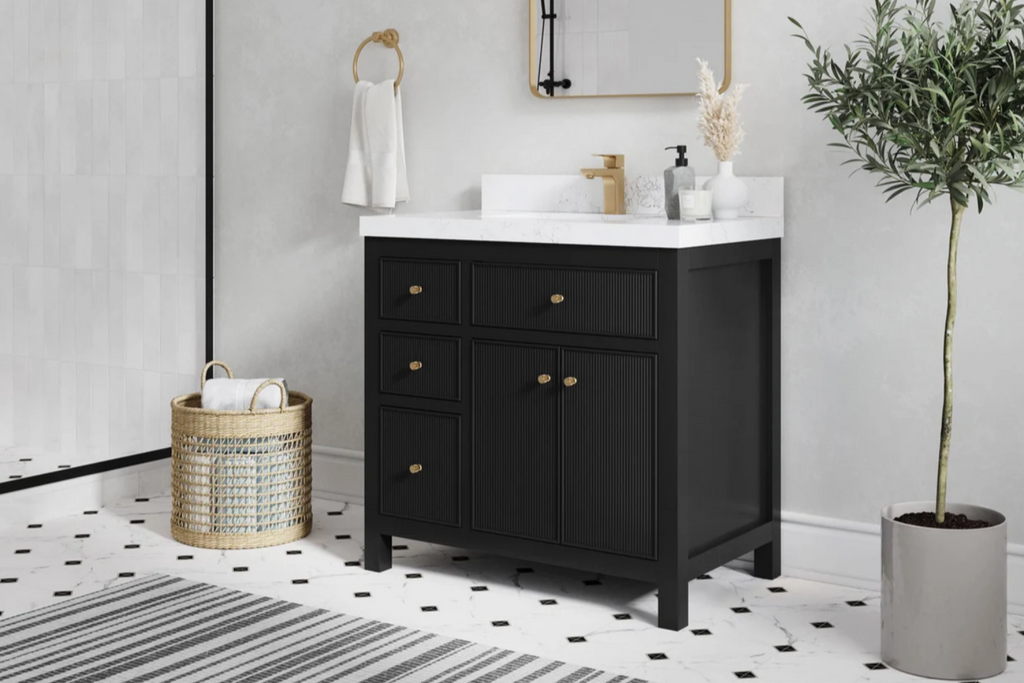 Freestanding center sink vanity in black with vertical reeded wood detailing.